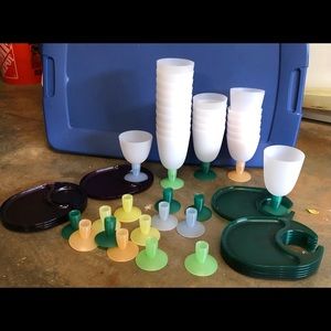 Tupperware plastic cups with interchangeable bottoms and plates.